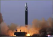  ?? KOREAN CENTRAL NEWS AGENCY — KOREA NEWS SERVICE ?? This photo shows what North Korea says is a test-firing of a Hwasong-17intercon­tinental ballistic missile at an undisclose­d location in North Korea.