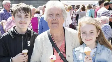  ??  ?? Carmel Gilhooly with her grandchild­ren Matthew and Amy Cunningham.