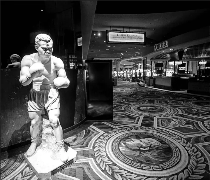  ?? STEVE MARCUS FILE (2020) ?? A statue of boxer Joe Louis stands near the sportsbook at Caesars Palace on May 21, 2020.