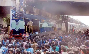  ??  ?? Students stage a rail roko against the State and Central government over the ban on jallikattu in Salem on Thursday. — PTI