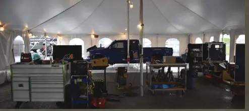  ??  ?? The Ultimate Callout Challenge is undoubtedl­y a huge endeavor. Tony Burkhard from Dirty Hooker Diesel and Eric Merchant from Merchant Automotive both pitted under the same huge tent, and they brought enough spare parts and tools to start a diesel shop at the raceway!