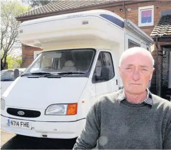  ??  ?? Standing his ground Edward Byrne with the van parked in his driveway