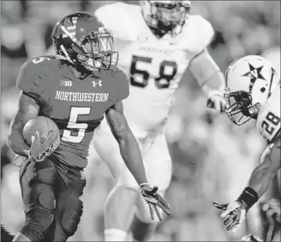  ??  ?? Only Venric Mark is “at a championsh­ip level” on offense, NU coach Pat Fitzgerald says.
| JOE ROBBINS~GETTY IMAGES