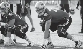  ?? AL SEIB/TRIBUNE NEWS SERVICE ?? UCLA offensive tackle Kolton Miller, right, during spring practice on April 6, 2017.