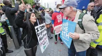  ??  ?? The two sides of the abortion debate clash during demonstrat­ions in Dublin City Centre in 2017.