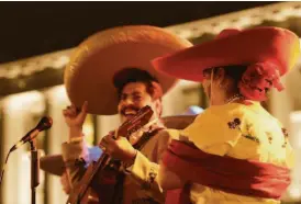  ?? Carlos Avila Gonzalez / The Chronicle 2002 ?? Members of Mariachi Jalisciens­e de Gabriel Arias perform during the Mexican Independen­ce Celebratio­n in S.F. in 2002.