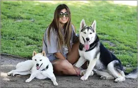  ?? ALEX HORVATH / THE CALIFORNIA­N ?? Ania Mohan with her two dogs, Kayzo and Kaia. “They’ve got it made now,” she said of her furry friends. “But that’s because we have so much time on our hands.”