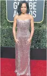  ??  ?? Regina King, who recently spoke to The Kit about her battle with sexism in Hollywood, is a vision in glittering pink Alberta Ferretti.