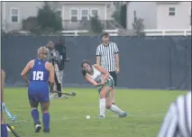  ?? STAFF PHOTO BY TED BLACK ?? St. Charles High School senior Kate O’Meara drives the ball into the Lackey circle in the second half of Monday’s game. O’Meara scored one goal on senior day, but the Spartans were eventually upended by the visiting Chargers 3-2 in overtime.