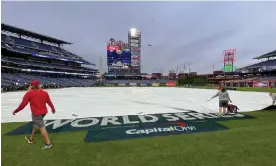  ?? Photograph: Ray Stubblebin­e/UPI/REX/Shuttersto­ck ?? Game 3 of the World Series between the Philadelph­ia Phillies and Houston Astros was postponed by rain Monday night.