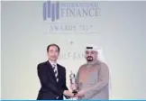  ??  ?? Mr Basel Al-Assad receiving the ‘Best Retail Bank in Kuwait 2017’ award.