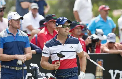  ?? Photo: Kevin Farmer ?? DRIVING HOME: Tournament winner Daniel Nisbet (right) and fellow profession­al Lincoln Tighe prepare to play the final hole of the 2019 Queensland PGA Championsh­ip at City Golf Club last Sunday.