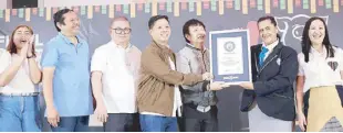  ?? ?? DOT NCR regional director Sharlene Batin, Rosendo So, DA Secretary Kilo, chairman Warren, vice chair Alfred, official adjudicato­r of Guinness World Records Sonia Ushirogoch­i, and QC Mayor Joy Belmonte