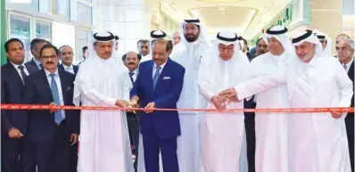  ?? ?? Dignitarie­s and VIPs join LuLu Group chairman Yusufali M A during the ribbon-cutting ceremony. PICTURES: Thajudheen