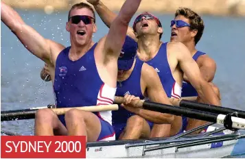  ??  ?? SYDNEY 2000
Ecstasy: Matthew Pinsent holds his harms aloft as the coxless four take gold