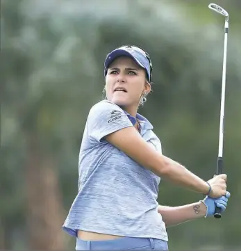  ?? Sam Greenwood/Getty Images ?? Lexi Thompson, who leads the CME Race to the Globe, put herself in a hole after the first round of the CME Group Tour Championsh­ip with a 71. She trails the leaders by five shots.