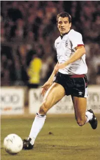  ??  ?? Steve Bull in the white shirt of England