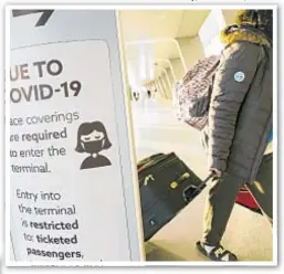  ??  ?? Despite warnings to avoid travel over Thanksgivi­ng to avoid spreading COVID-19, Americans flocked to airports for family gatherings, with nearly 1.2 million traveling Sunday, the most since pandemic began.