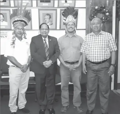  ??  ?? Toshao Lenox Shuman (second, from right) in the company of Prime Minister Moses Nagamootoo (second, from left), Chairman of the National Toshaos Council Toshao Joel Fredricks (at left) and NTC executive member Toshao Aubrey Samuels