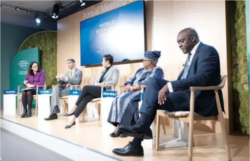  ?? WAM ?? ↑
Dr Thani Bin Ahmed Al Zeyoudi speaks during a panel discussion at the World Economic Forum in Davos, Switzerlan­d, on Thursday.