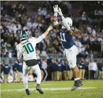  ?? SCOTT TAETSCH/GETTY ?? Penn State’s Abdul Carter jumps to knock down a pass attempt by Michigan State’s Payton Thorne during the second half of a Nov. 26 game in State College.