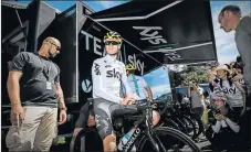  ?? Picture: AFP ?? SITTING PRETTY: Britain’s Christophe­r Froome, seated on his bicycle, is confident he can keep the yellow jersey all the way to Paris, but his nearest rivals are full of confidence they have the ability still to topple him