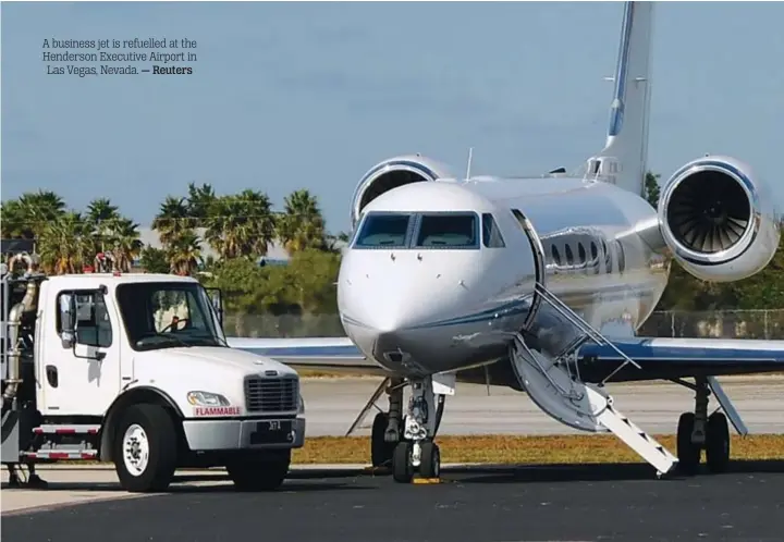  ?? — Reuters ?? A business jet is refuelled at the Henderson Executive Airport in Las Vegas, Nevada.