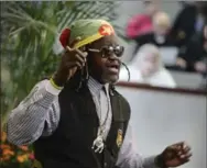  ??  ?? Reggae/soca singer Kenny C sings Bob Marley’s “Everything’s Gonna Be Alright.”