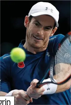  ?? REUTERS ?? Power play: Murray fires a double-handed backhand on his way to victory