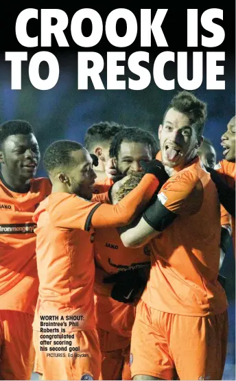  ?? PICTURES: Ed Boyden ?? WORTH A SHOUT: Braintree’s Phil Roberts is congratula­ted after scoring his second goal