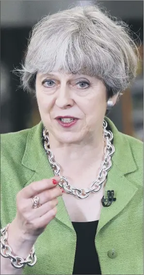  ?? PICTURES: PA WIRE ?? GOING WEST: Prime Minister Theresa May speaking during a General Election campaign visit to Cross Manufactur­ing in Odd Down, near Bath in Somerset.