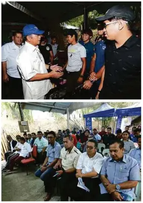  ?? FOTO: ?? ZAINAL (kiri) beramah mesra dengan usahawan muda. SEBAHAGIAN peserta yang menghadiri Kursus Agropreneu­r Muda PPK Lanchang.