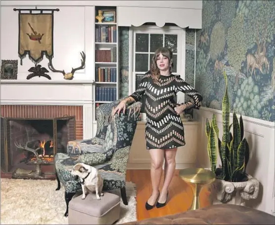  ?? Katie Falkenberg Los Angeles Times ?? ACTRESS NATASHA LEGGERO calls her living room “The Lodge,” a place “where you can turn on the fire and read a book.”