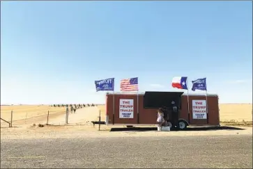  ?? Photograph­s by Mark Potts Los Angeles Times ?? A ROLLING shop called the Trump Trailer will sell anywhere from 50 to 250 masks a day in Amarillo, Texas.