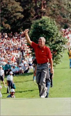  ?? Tom Kilips / Associated Press ?? Curtis Strange reaches the 18th green waving to the crowd as he is about to win the U.S. Open in 1989 at Oak Hill Country Club. He also lost there in the Ryder Cup in 1995.