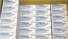  ??  ?? Boxes of the Johnson & Johnson COVID-19 vaccine are ready Monday at a McKesson Corp. site in Shepherdsv­ille, Kentucky.