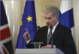  ?? FRANK AUGSTEIN, POOL — THE ASSOCIATED PRESS ?? Finland's President Sauli Niinisto makes a point during a joint press conference with British Prime Minister Boris Johnson, at the Presidenti­al Palace in Helsinki, Finland, Wednesday.