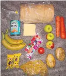  ??  ?? DISGRACEFU­L Food parcel sent to parents on low incomes