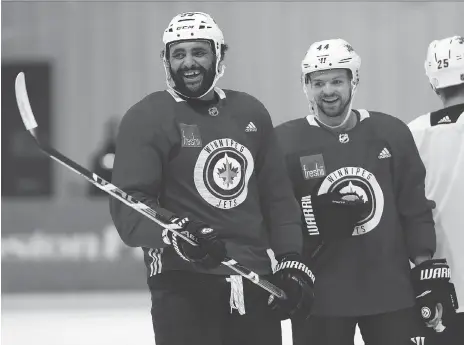  ?? PHOTOS: KEVIN KING ?? He’s not as flashy as Dustin Byfuglien, left, but Josh Morrissey has become an important part of the Winnipeg Jets’ defence corps.
