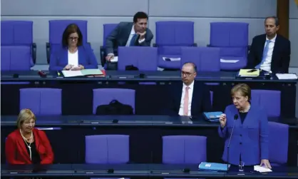  ??  ?? Angela Merkel speaking in the Bundestag. She said she took the hacking attack ‘very seriously’. Photograph: Anadolu Agency via Getty Images