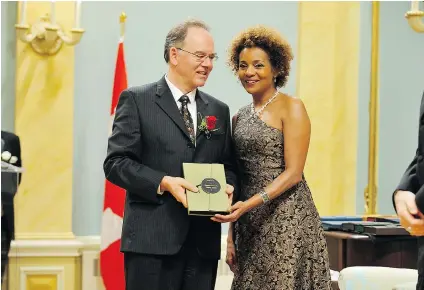  ?? MASTER CPL. JEAN-FRANCOIS NERON ?? David Zieroth, shown receiving the 2009 poetry award from then-governor general Michëalle Jean, has released a new collection.