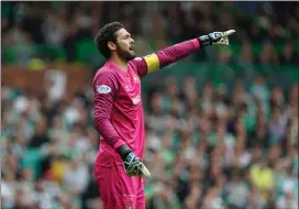  ?? ?? Hearts goalkeeper Craig Gordon made a string of saves at Parkhead