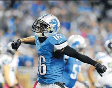  ?? Al Messerschm­idt Getty Images ?? DETROIT wide receiver Titus Young exults after catching a touchdown pass against Seattle in 2012. His oncepromis­ing career with the Lions disintegra­ted in a series of altercatio­ns and worrisome behavior.