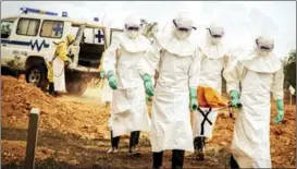  ?? PHOTOS PROVIDED TO CHINA DAILY ?? Scenes from Ebola Fighters, starring Luo Jin (top) in the lead role of a doctor. The series is inspired by the real-life stories of how Chinese and African doctors joined hands to fight against the deadly virus.