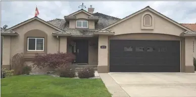  ?? Contribute­d ?? This four-bedroom, three-bathroom home in the Quail Ridge golf community is listed for sale at $709,000, just a few thousand dollars more than the Central Okanagan's new record single-family home average selling price of $703,809.