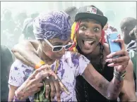  ?? PICTURE: EPA ?? Revellers take part in the Children’s Day parade of the Notting Hill Carnival in London, yesterday. The street festival his year celebrated its 52nd anniversar­y and more than a million people were expected to attend.