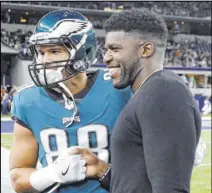  ?? Michael Ainsworth The Associated Press ?? Emmanuel Acho, right, shown in 2017 with former Eagles teammate Trey Burton, celebrated his 30th birthday Tuesday with the release of his book: “Uncomforta­ble Conversati­ons with a Black Man.”