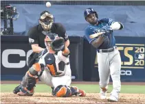  ?? REUTERS ?? TAMPA BAY RAYS LEFT FIELDER RANDY AROZARENA (56) hits a single against the Houston Astros during the ninth inning in game three of the 2020 ALCS at Petco Park.