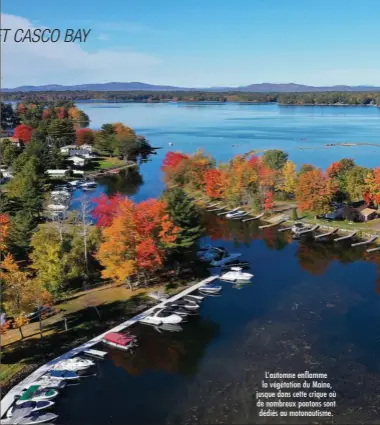  ??  ?? L’automne enflamme la végétation du Maine, jusque dans cette crique où de nombreux pontons sont dédiés au motonautis­me.