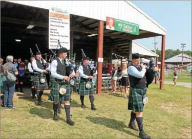  ?? PHOTOS BY LAUREN HALLIGAN — LHALLIGAN@DIGITALFIR­STMEDIA.COM ?? Bagpipers perform at Irish 2000, a music and arts festival held on Saturday at the Saratoga County Fairground­s in Ballston Spa.